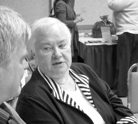 Sharing ideas: Myrna Leishman, at right, in discussion with City Councillor Chris McNaughton.