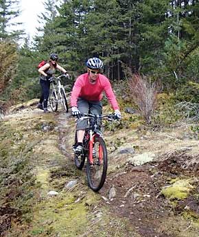 OUT IN THE WILD: Members of the Wild Women Cycling Club tackle a narrow track