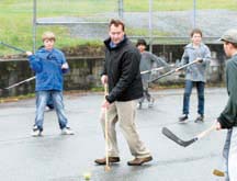 PRINCIPAL ON THE BALL: Road hockey returned to Grief Point this year, with the arrival of Jamie Burt as principal.He spends many lunch hours playing with the students.